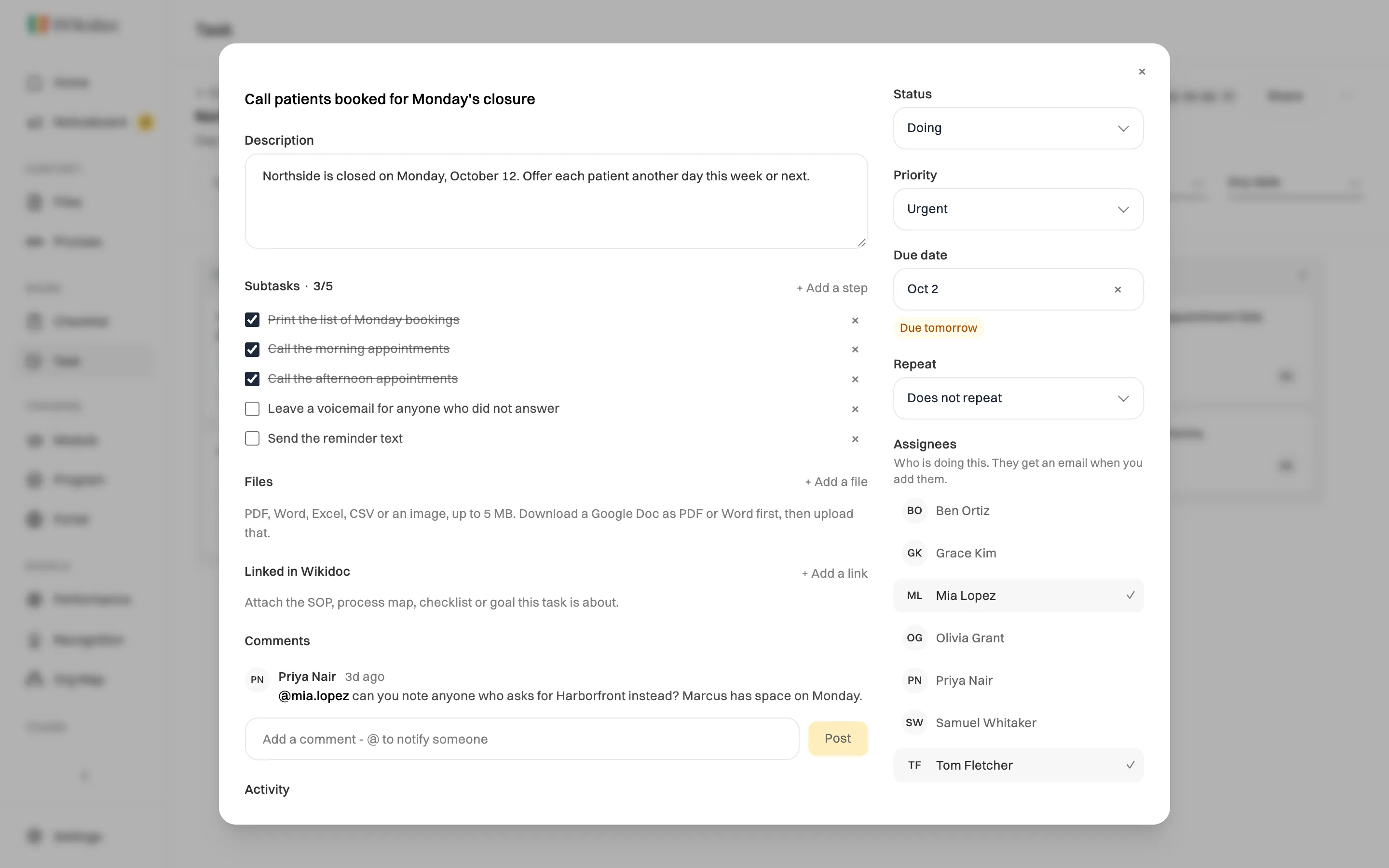 An open card, Call patients booked for Monday's closure: a description, subtasks with 3 of 5 ticked, Files, Linked in Wikidoc and a comment from Priya Nair mentioning @mia.lopez; on the right, Status Doing, Priority Urgent, Due date Oct 2 marked Due tomorrow, Repeat, and Assignees with Mia Lopez and Tom Fletcher ticked