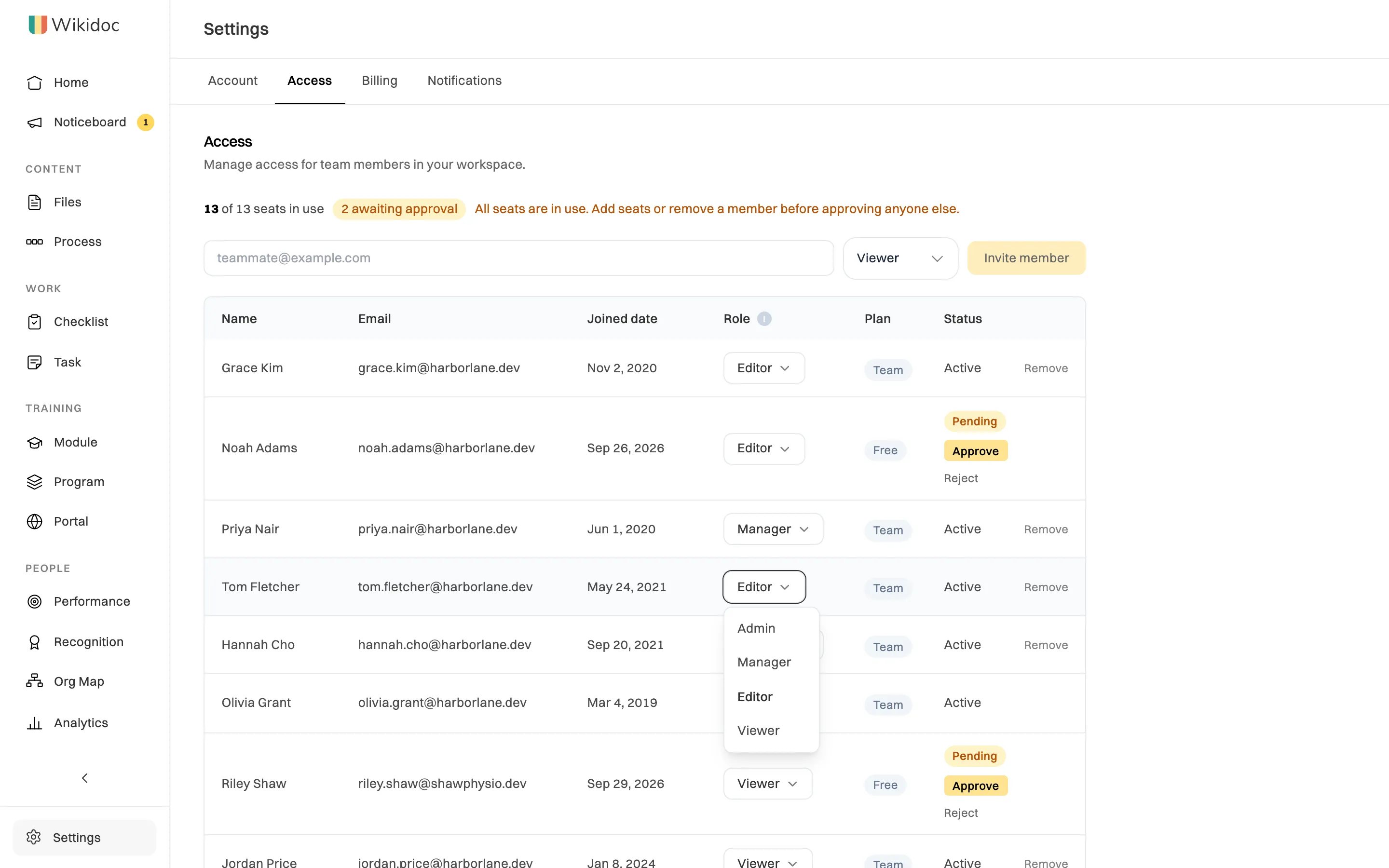 The role menu open on a member row, listing Admin, Manager, Editor and Viewer