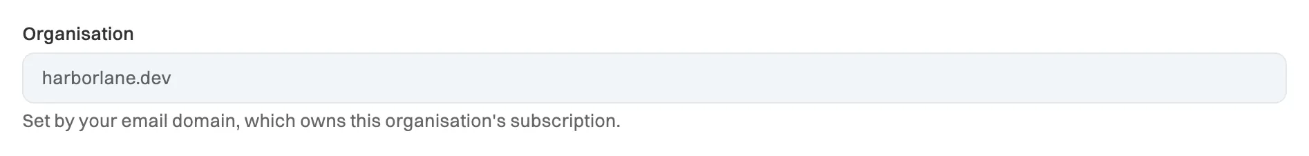 The Organisation field on the Account tab showing harborlane.dev, grayed out, with the note: Set by your email domain, which owns this organisation's subscription